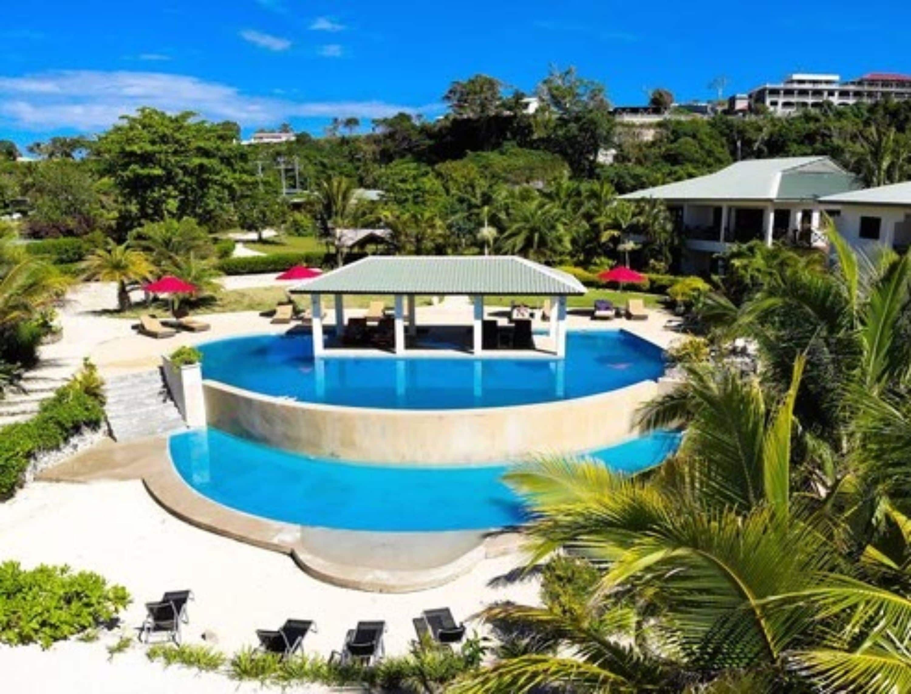 outdoor pool, pool umbrellas, pool loungers