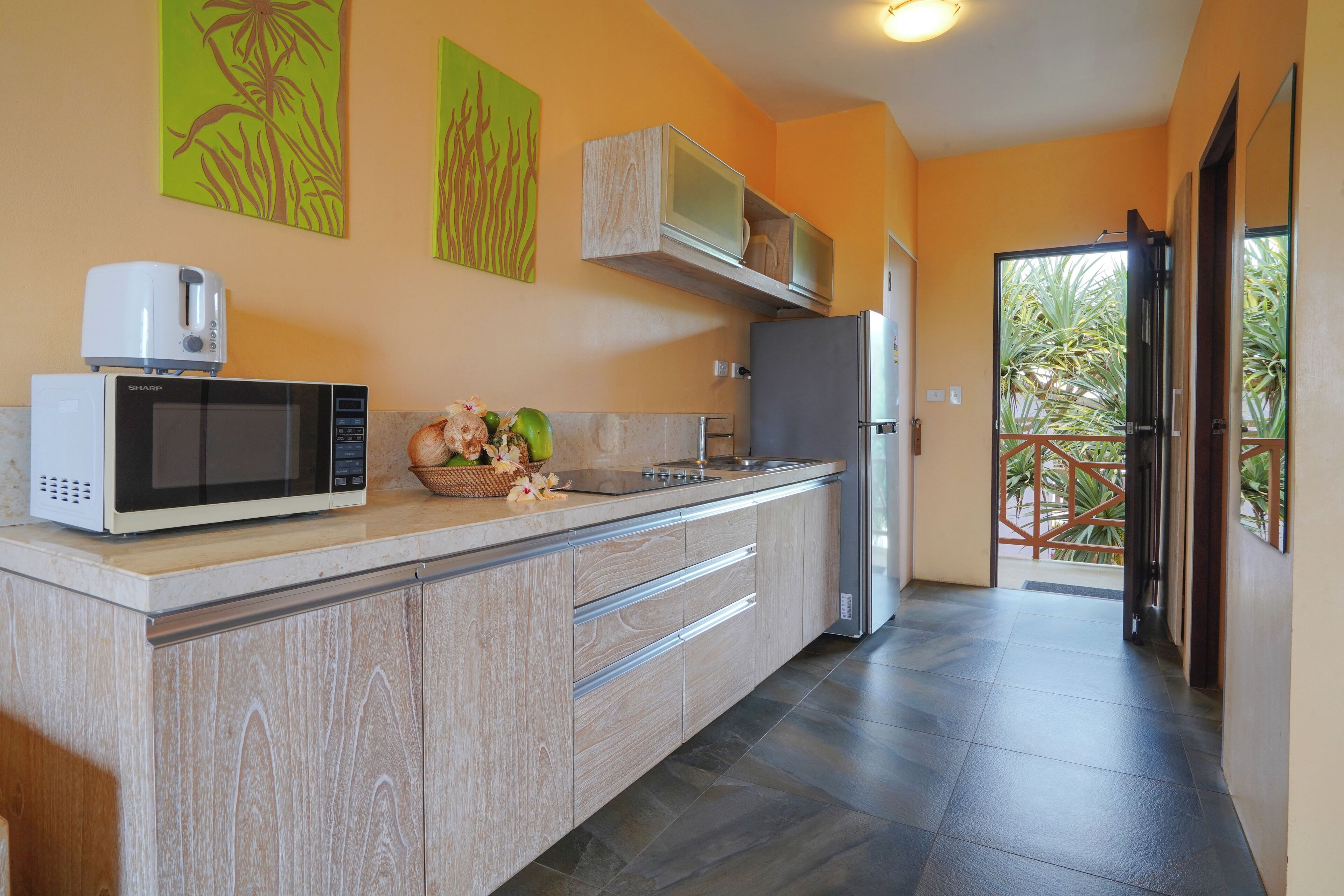 full-sized fridge, coffee/tea maker, electric kettle, toaster