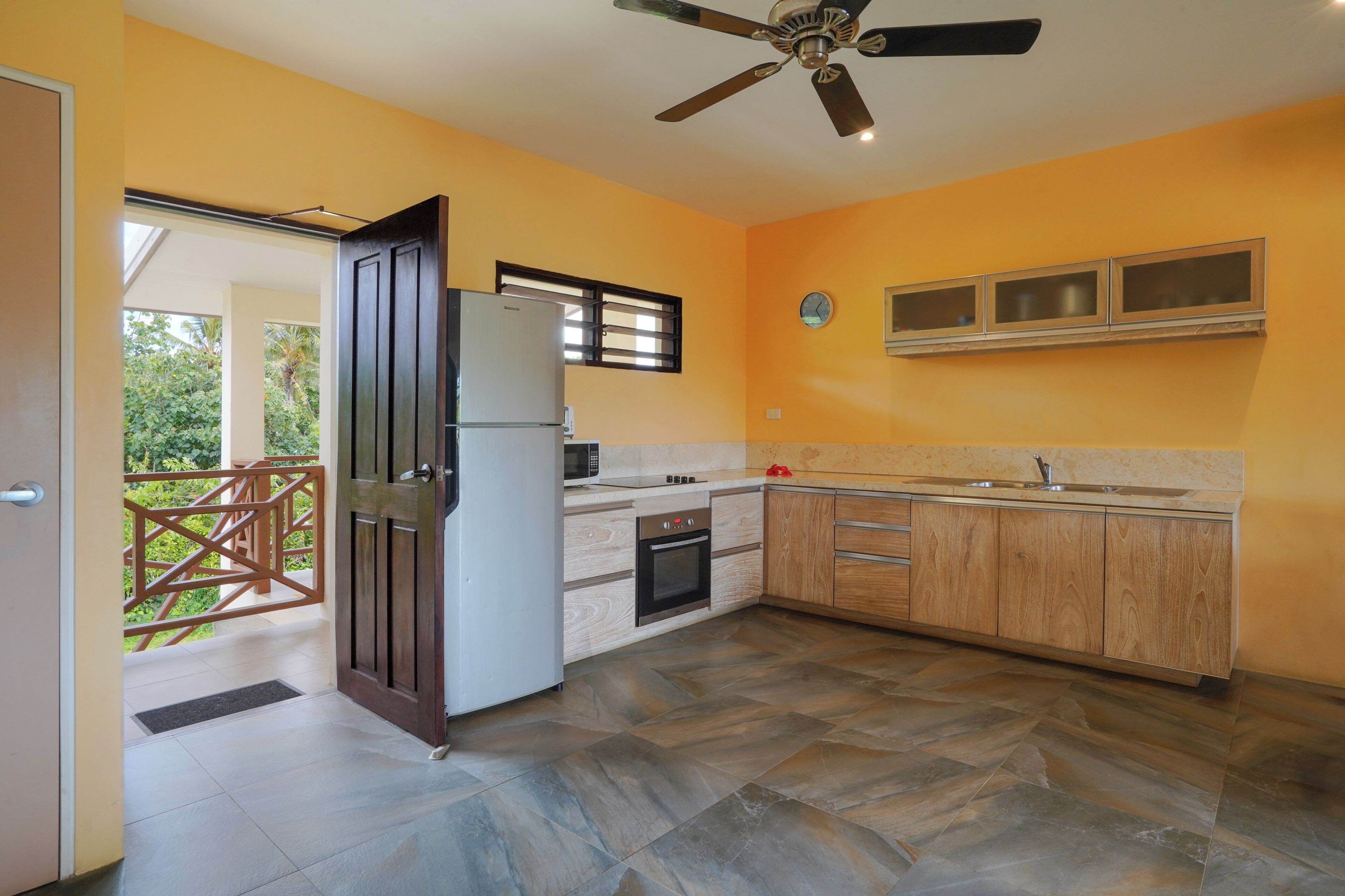 seaview two-bedroom apartment | private kitchen | full-sized fridge, coffee/tea maker, electric kettle, toaster