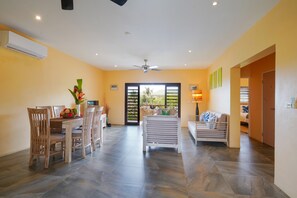 Seaview Two-Bedroom Apartment | Living area | 42-cm Smart TV with digital channels