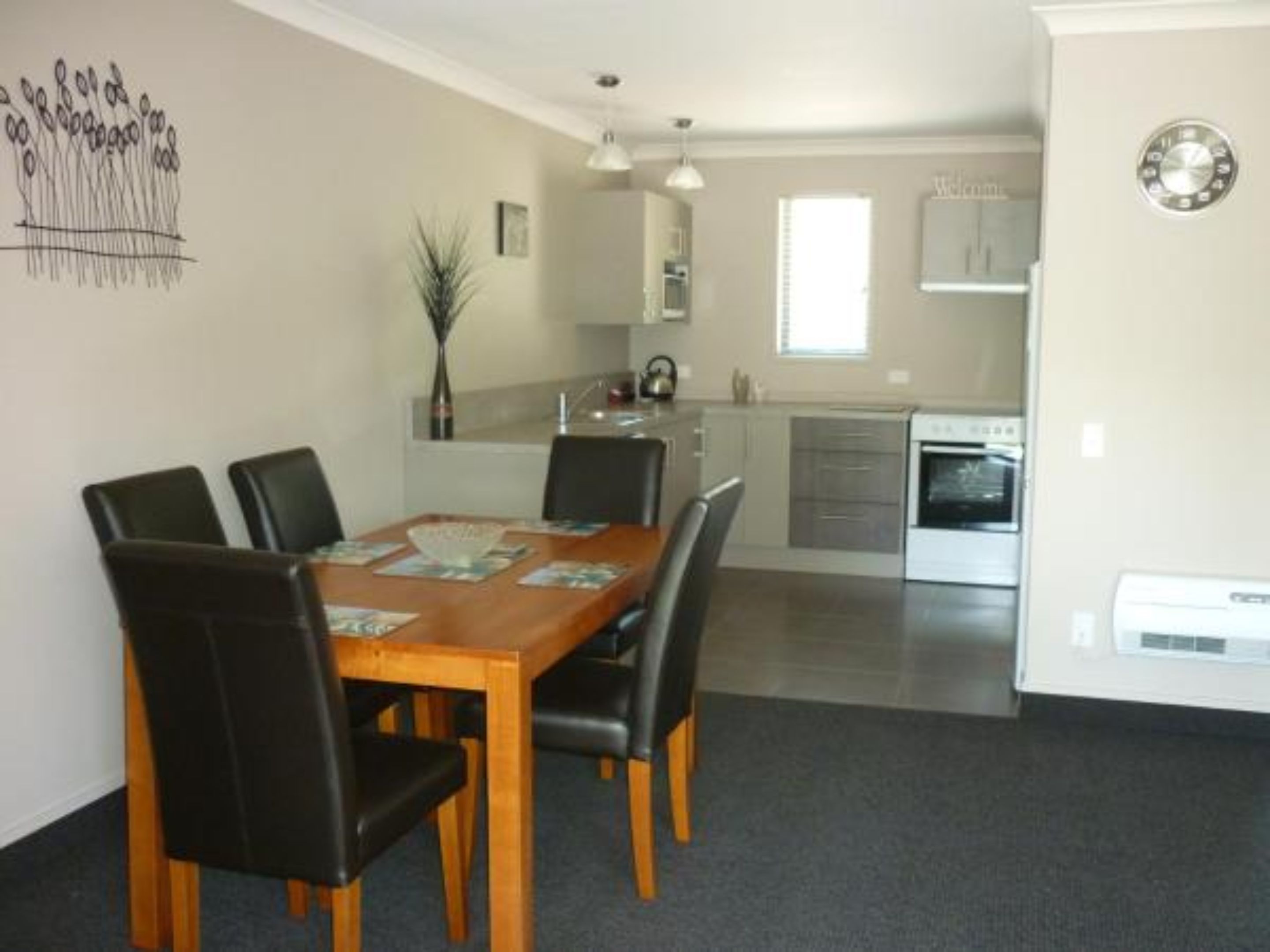 Two Bedroom Apartment | Private kitchen | Fridge, electric kettle, toaster, high chair