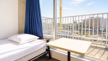Twin Room, 2 Twin Beds, Non Smoking, Shared Bathroom | Blackout drapes, iron/ironing board (on request), WiFi (free)
