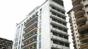 A multi-story residential building with balconies, a flat facade, and a simple architectural design. - YY38 Hotel (Kuala Lumpur)