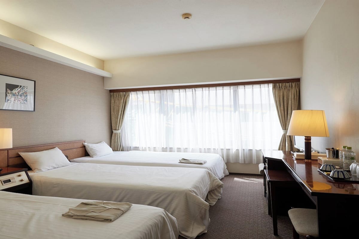 Triple Room, Non Smoking | 1 bedroom, down comforters, in-room safe, desk