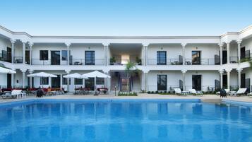 Outdoor pool, pool umbrellas, pool loungers