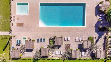 2 outdoor pools, open 9:00 AM to 6:00 PM, pool loungers