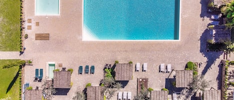 2 outdoor pools, open 9:00 AM to 6:00 PM, pool loungers