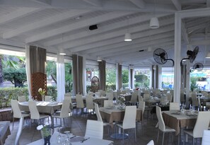 Breakfast, lunch, dinner served; local cuisine, garden views