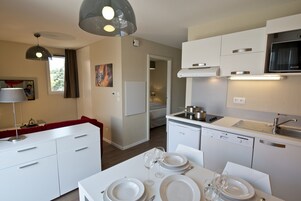 Standard Apartment, 2 Bedrooms | In-room dining