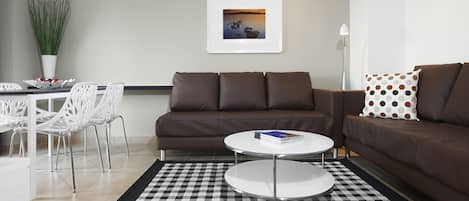 Deluxe Apartment, City View | Living area | 32-inch flat-screen TV with digital channels, LCD TV