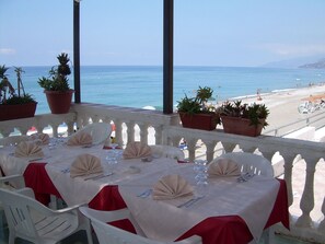Breakfast, lunch, dinner served; Italian cuisine, beach views