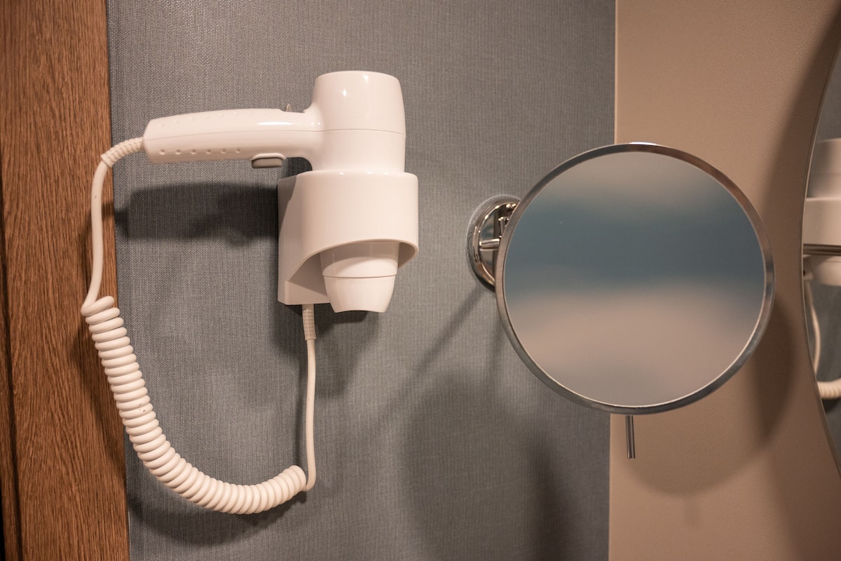 shower, eco-friendly toiletries, hair dryer, towels