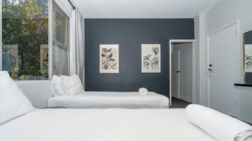 Queen Plus Two | Premium bedding, free minibar, individually decorated