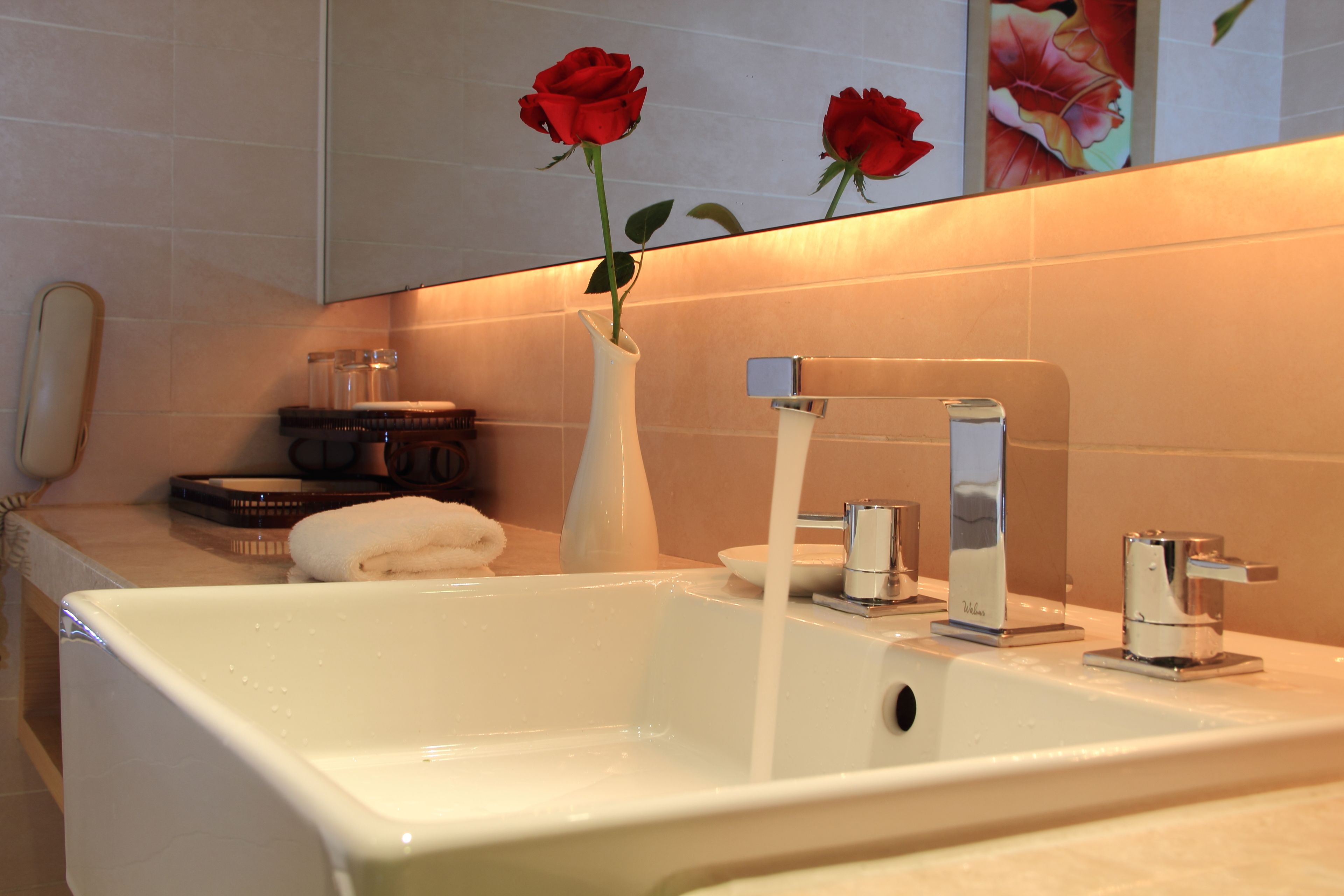 superior room, 1 king bed | bathroom | eco-friendly toiletries, hair dryer, bathrobes, slippers