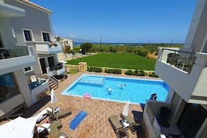 Seasonal outdoor pool, pool umbrellas