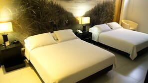 Premium bedding, down comforters, pillowtop beds, minibar - Hotel Puerta de San Antonio (Cali)