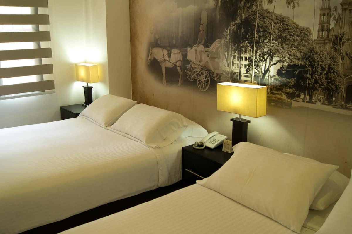 Ropa de cama de alta calidad, edredón, camas con pillow-top y minibar