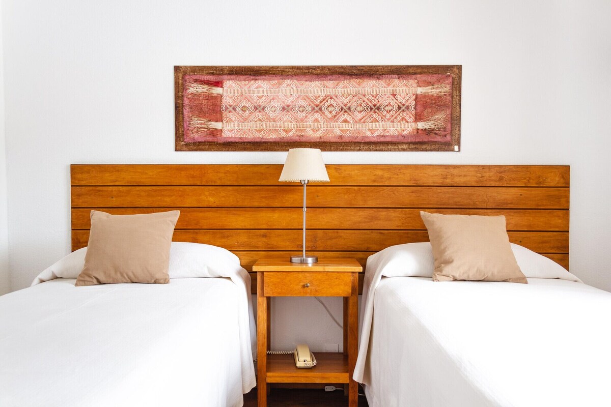 Ropa de cama de alta calidad y minibar 