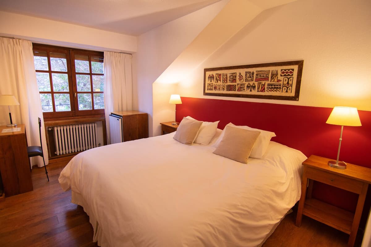 Ropa de cama de alta calidad y minibar