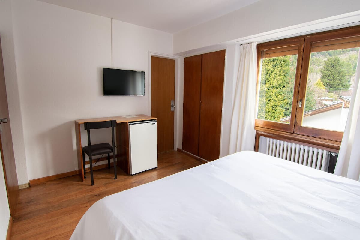 Ropa de cama de alta calidad y minibar