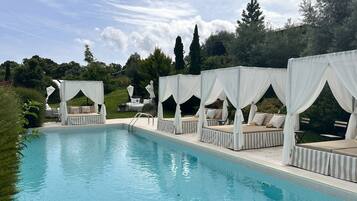Indoor pool, seasonal outdoor pool, free cabanas, pool umbrellas