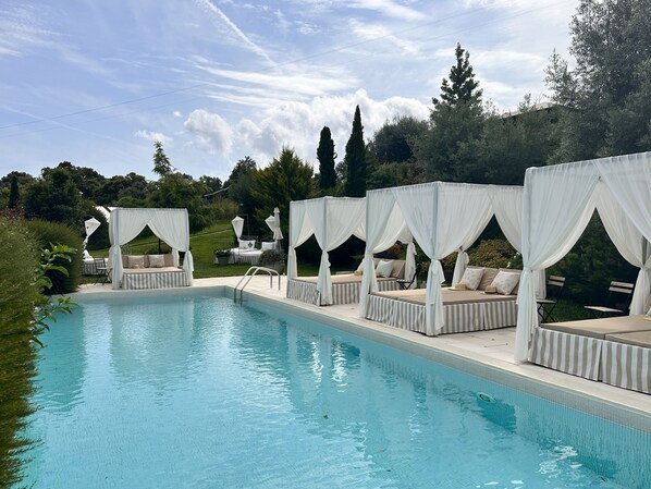 Indoor pool, seasonal outdoor pool, free pool cabanas, pool umbrellas