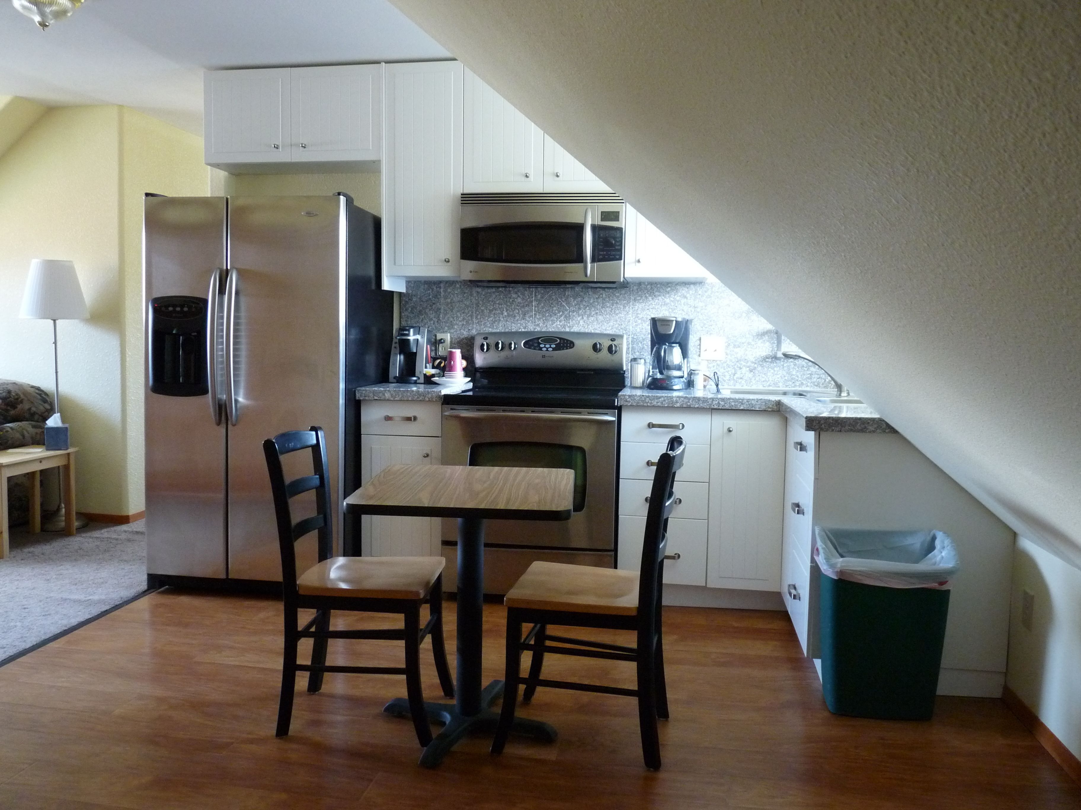 seaside lodge room #27 (room with 1 queen bed, 1 twin beds, and 2 toddler beds)  | private kitchenette