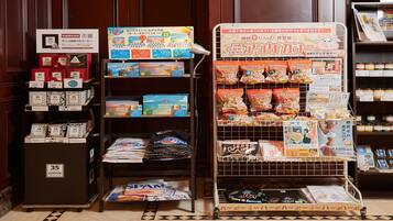 A coffee shop display with various coffee brands and products.