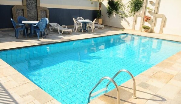 Outdoor pool, pool loungers