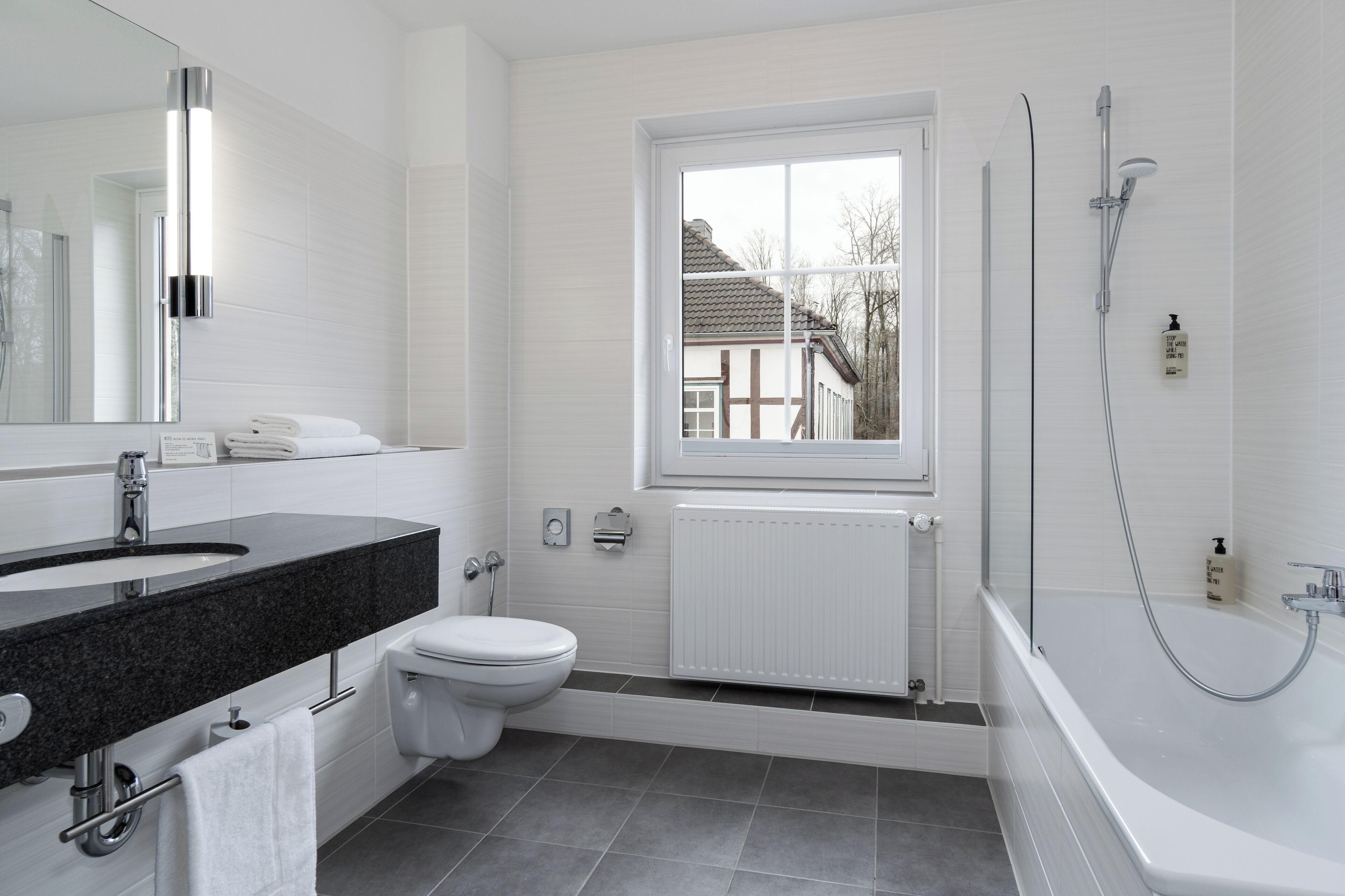 family suite | bathroom | free toiletries, hair dryer, towels