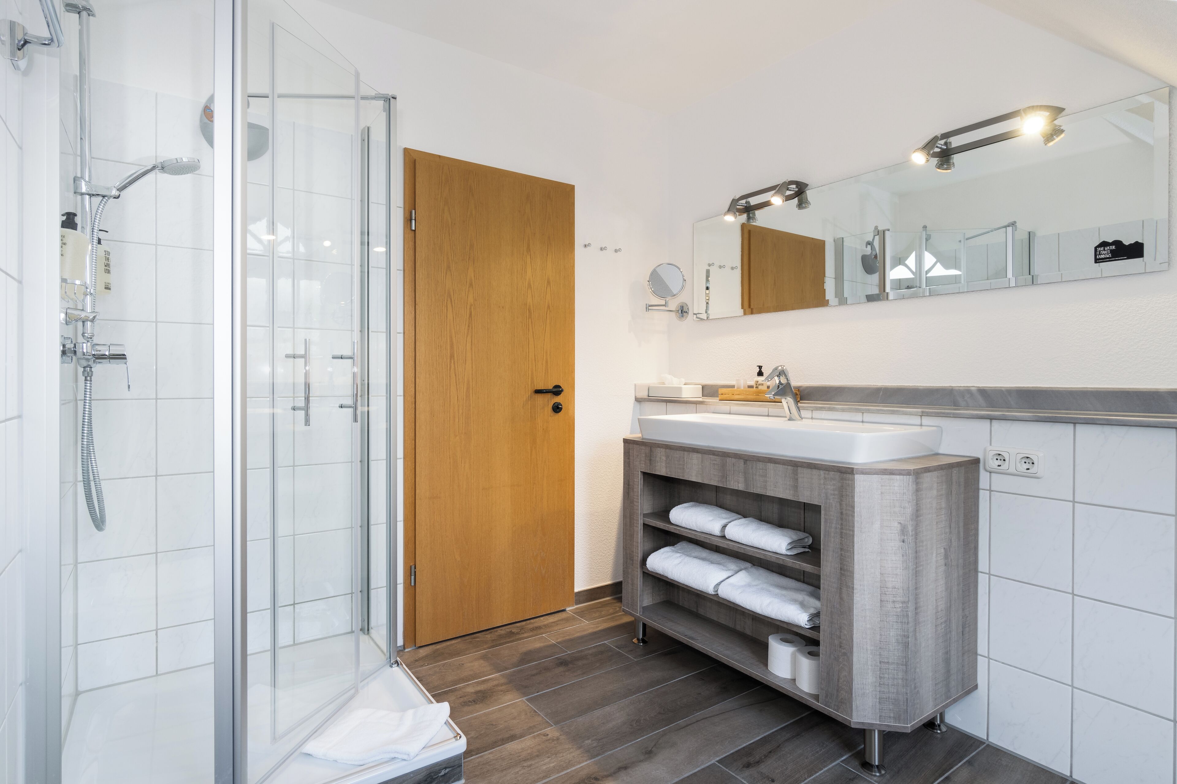 superior studio suite | bathroom | free toiletries, hair dryer, towels