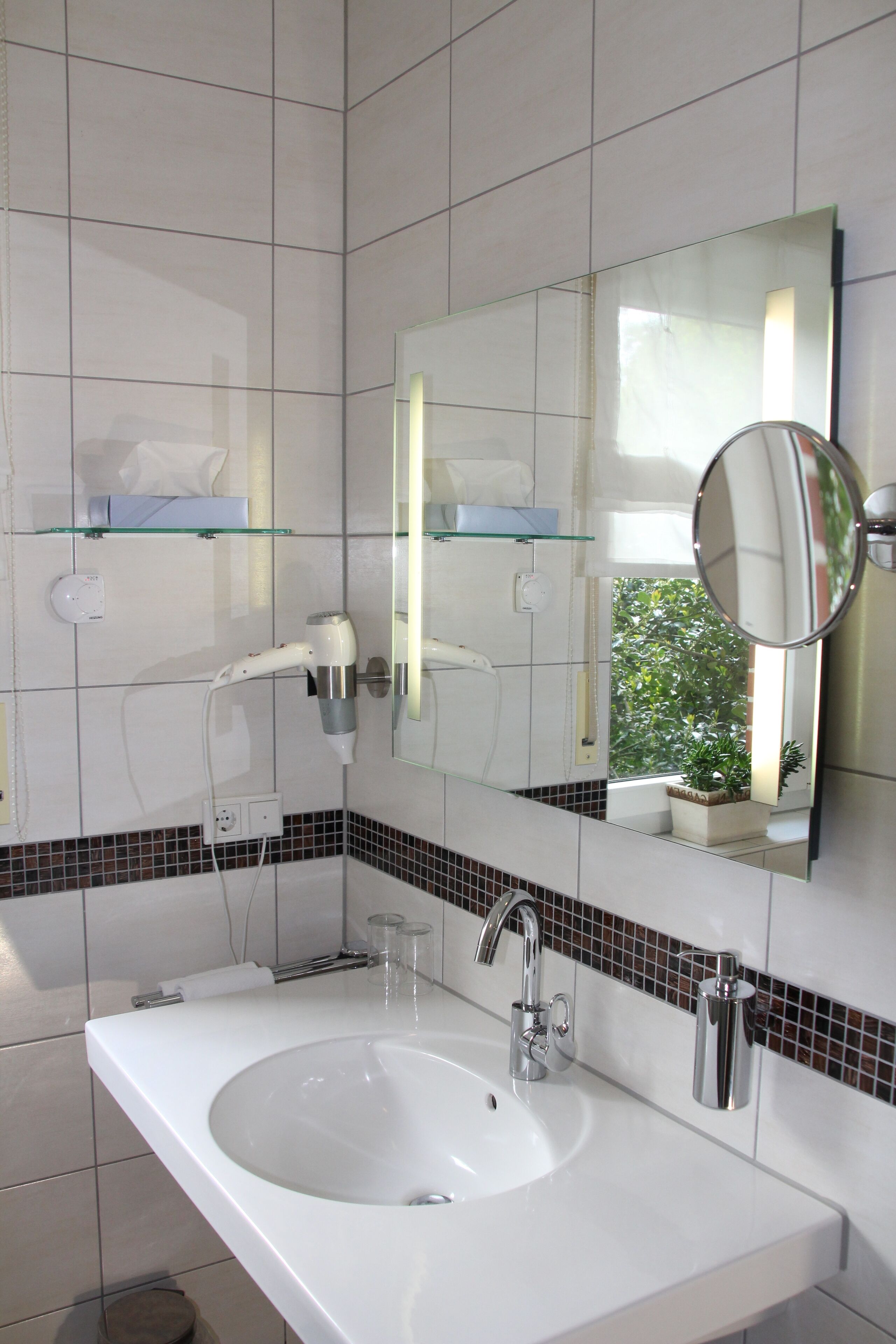 hair dryer, bathrobes, slippers, towels