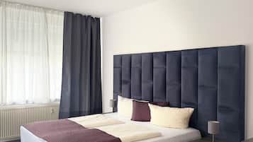 Ropa de cama de alta calidad, minibar y escritorio