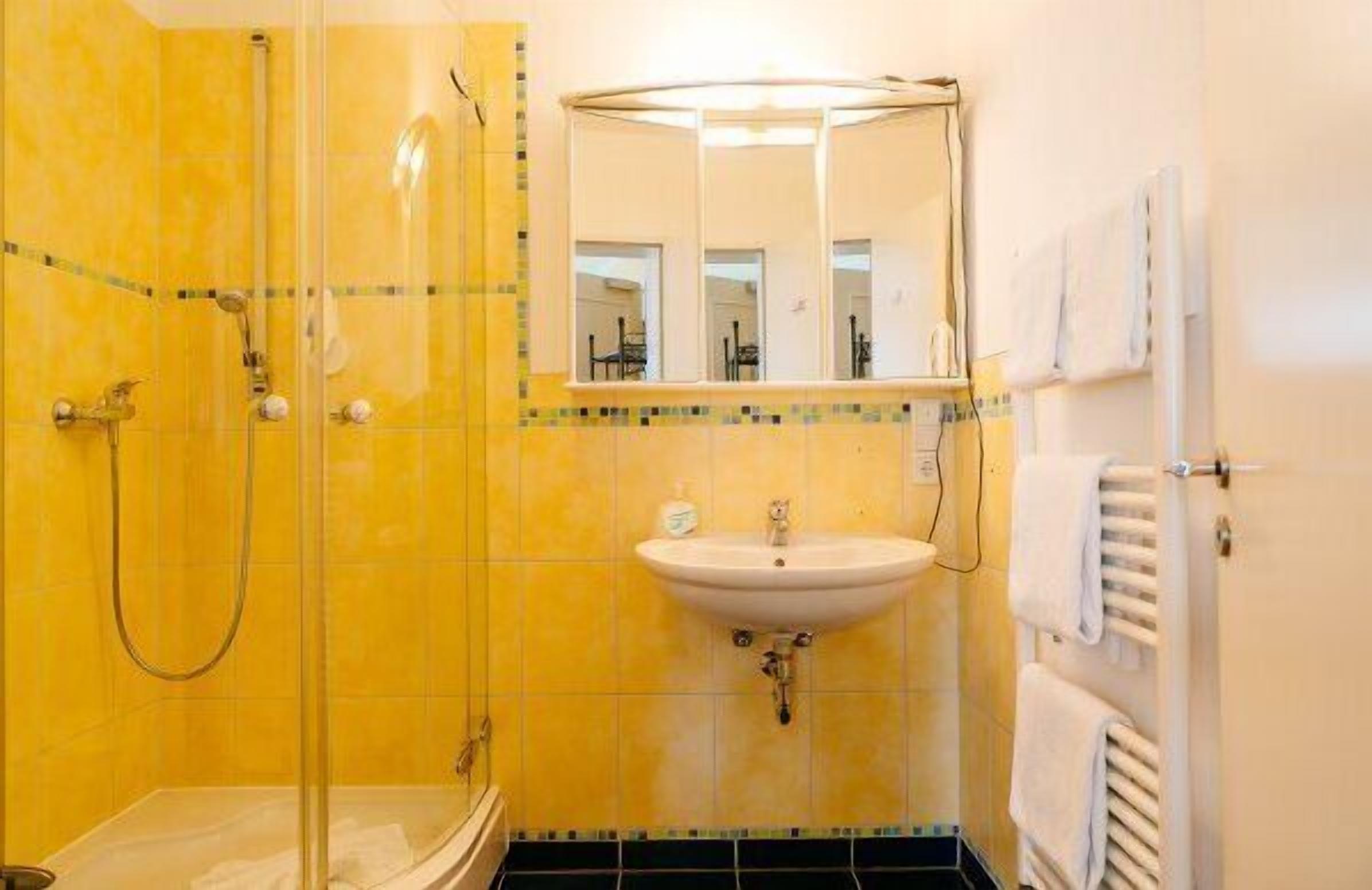 family room | bathroom | shower, free toiletries, hair dryer, towels