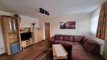 Junior-Suite | Wohnbereich | Fernseher