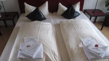 Premium bedding, iron/ironing board, free cots/infant beds, free WiFi