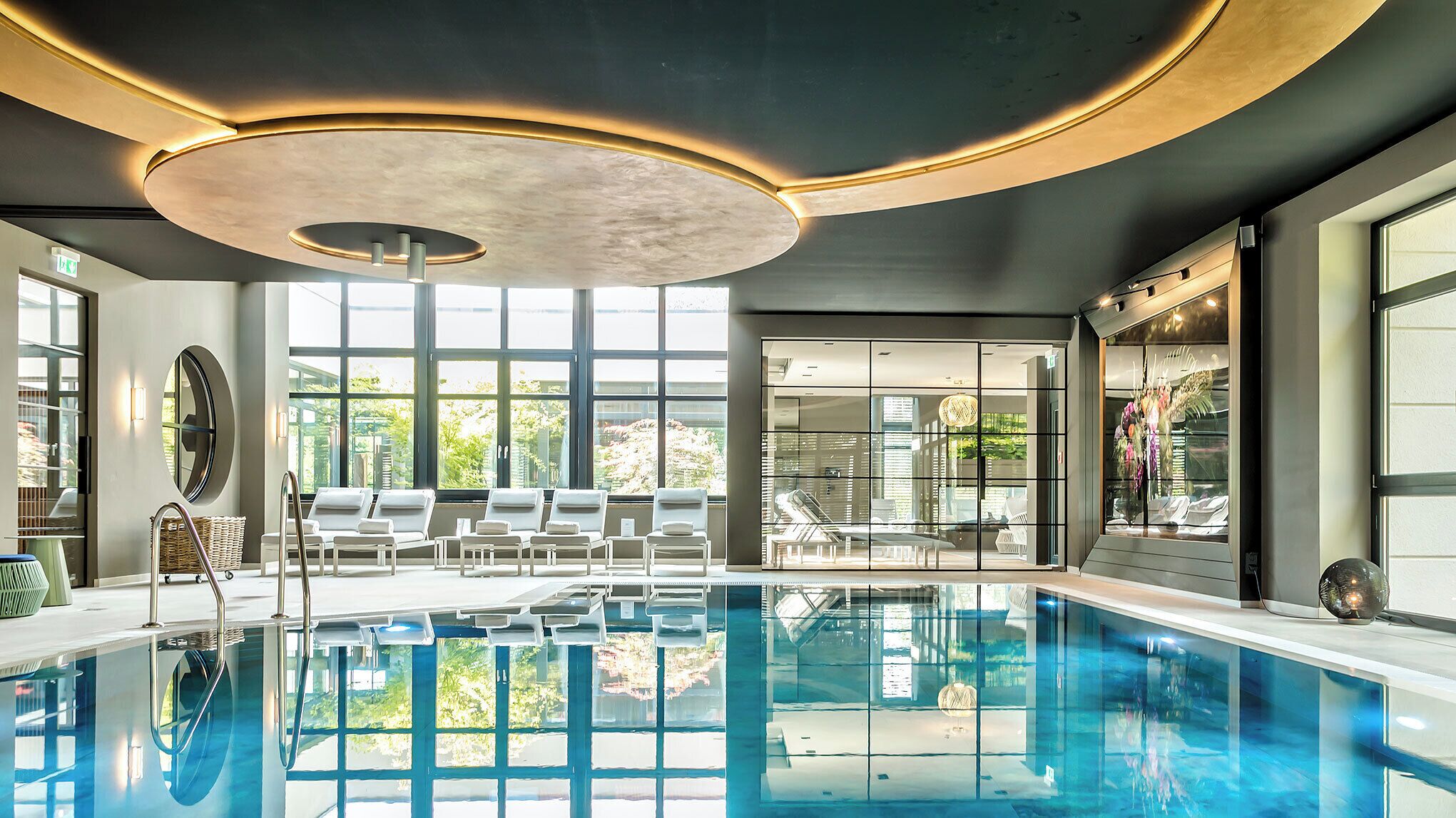 Indoor pool, seasonal outdoor pool, pool umbrellas, sun loungers