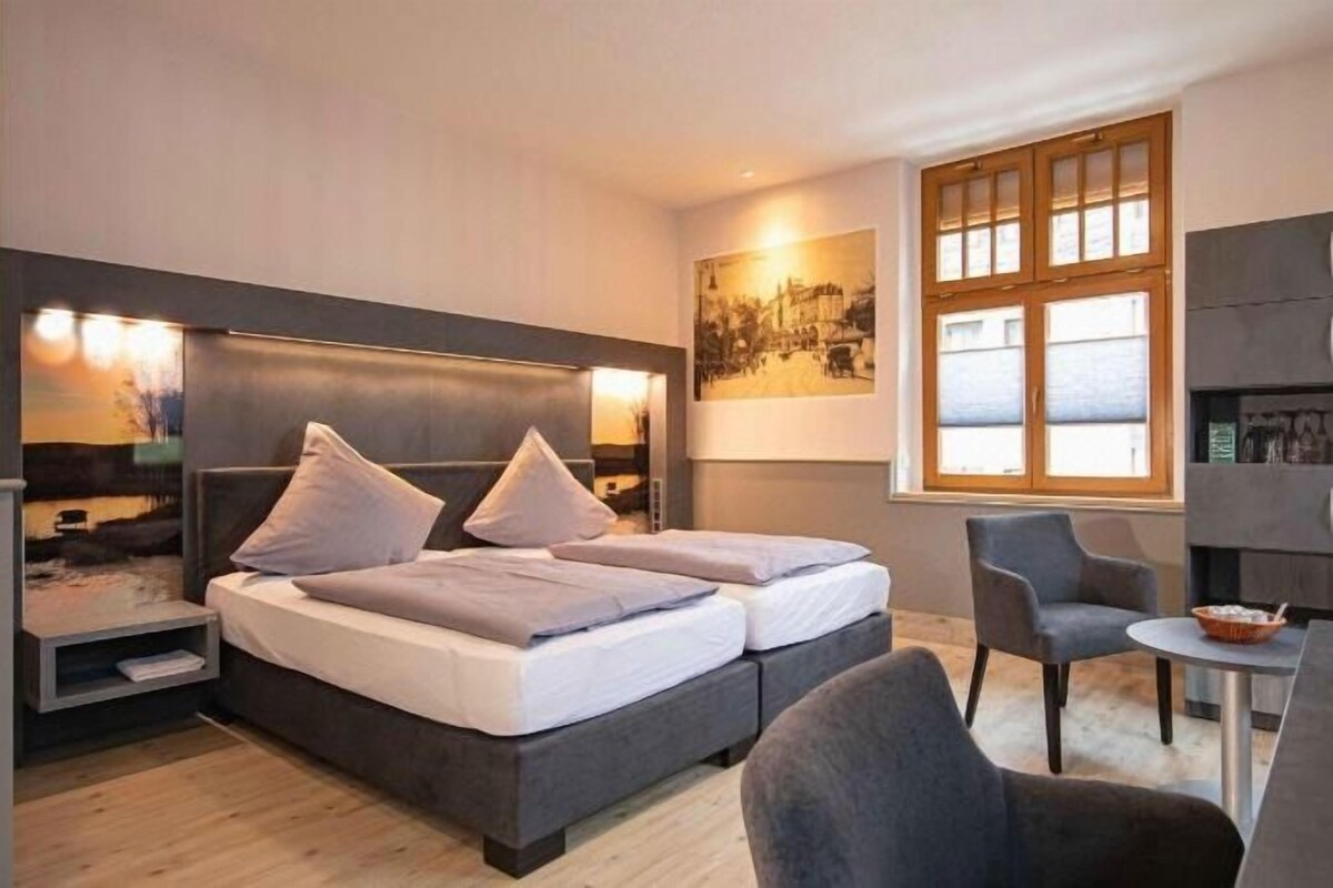 Ropa de cama de alta calidad y minibar 