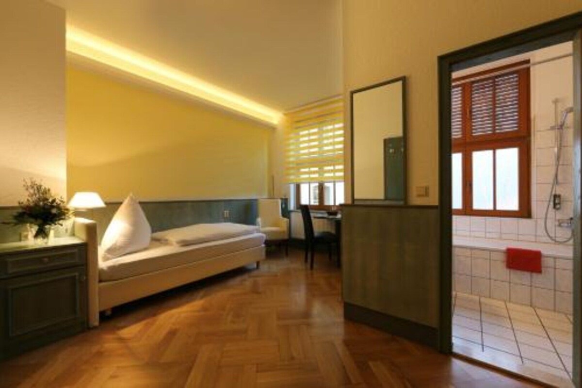 Ropa de cama de alta calidad y minibar 