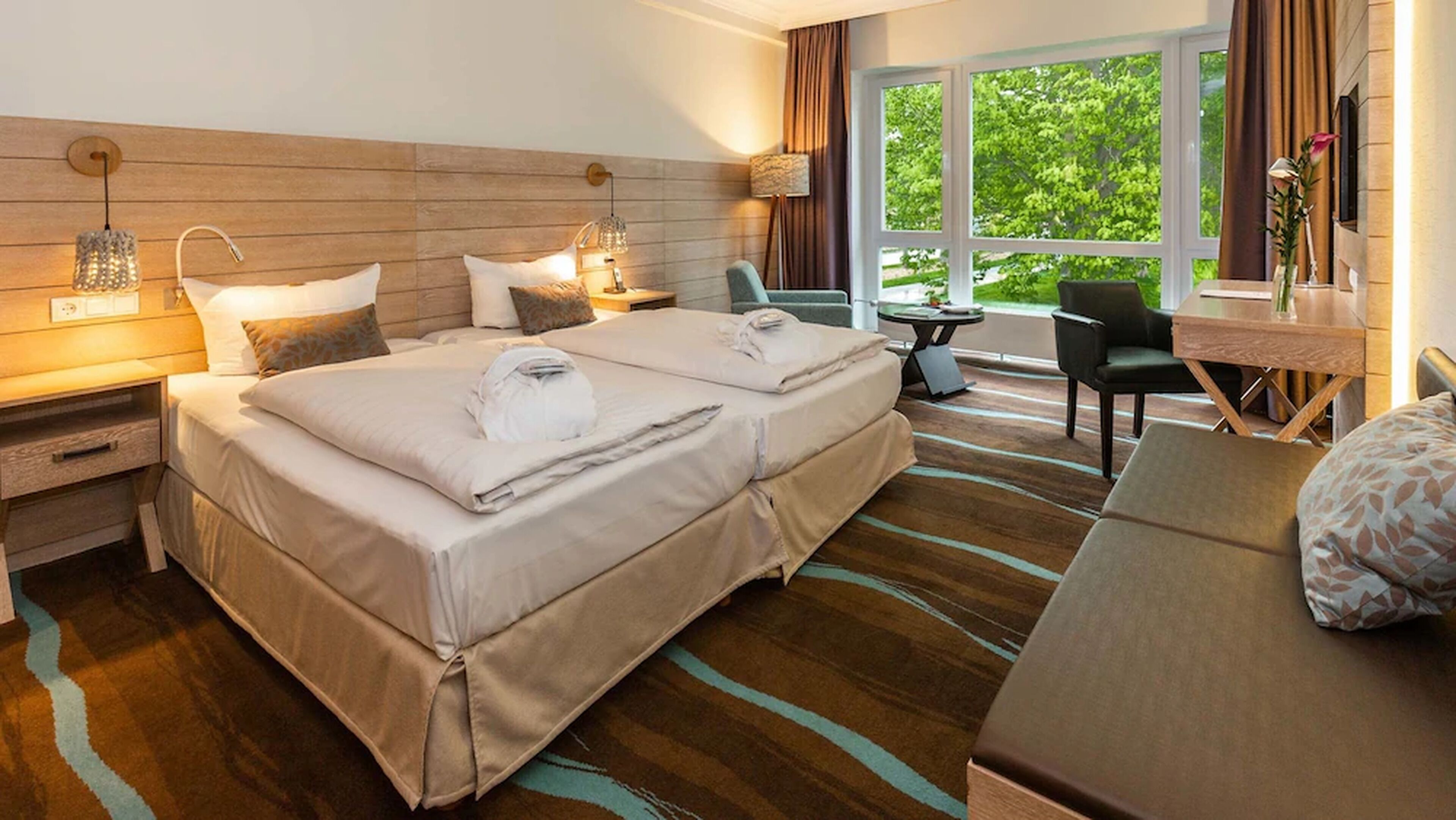 comfort room (view to the lake or to the terrace) | living area | 32-inch flat-screen tv with cable channels, tv