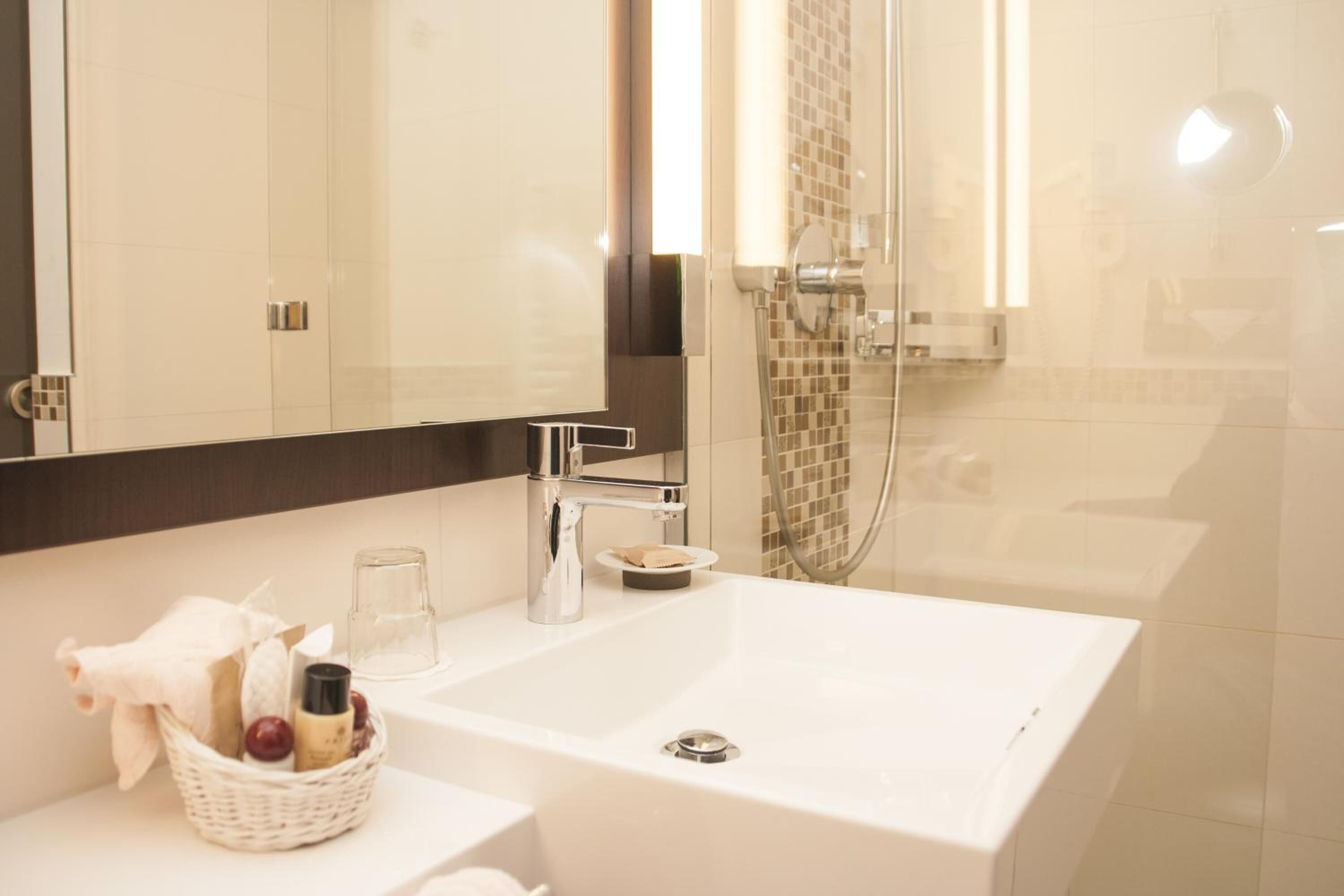 standard double room | bathroom | hair dryer, towels