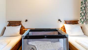 Desk, laptop workspace, WiFi (free), bed sheets