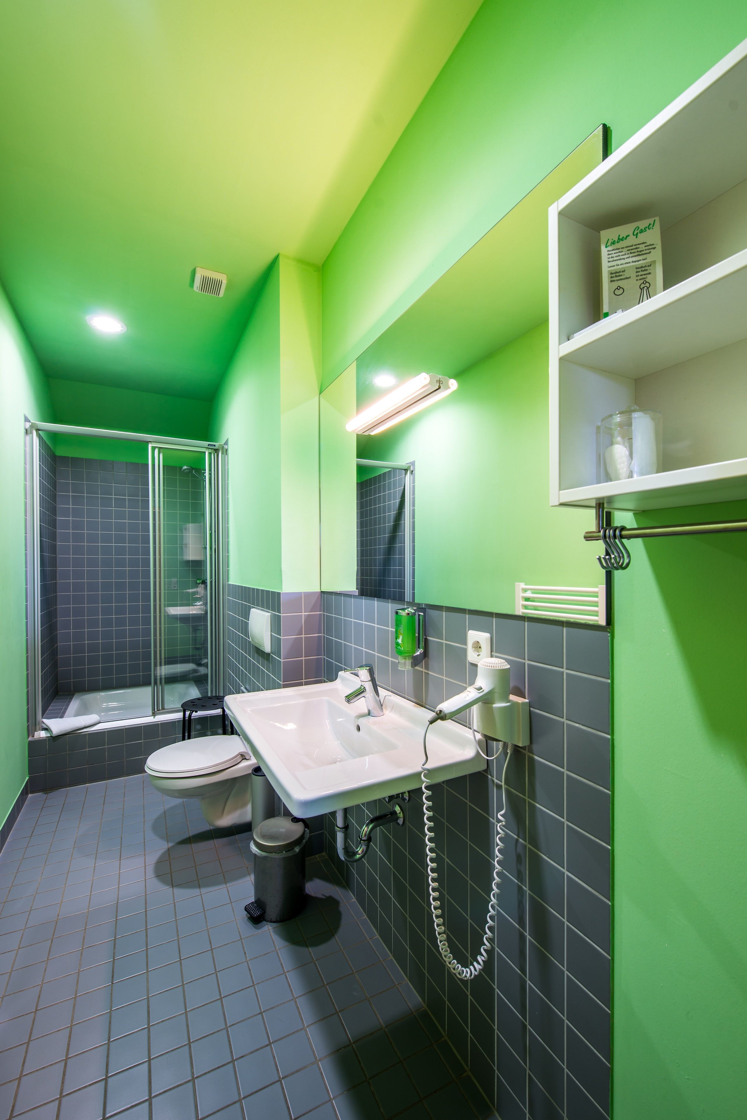 standard single room | bathroom | shower, free toiletries, hair dryer, towels