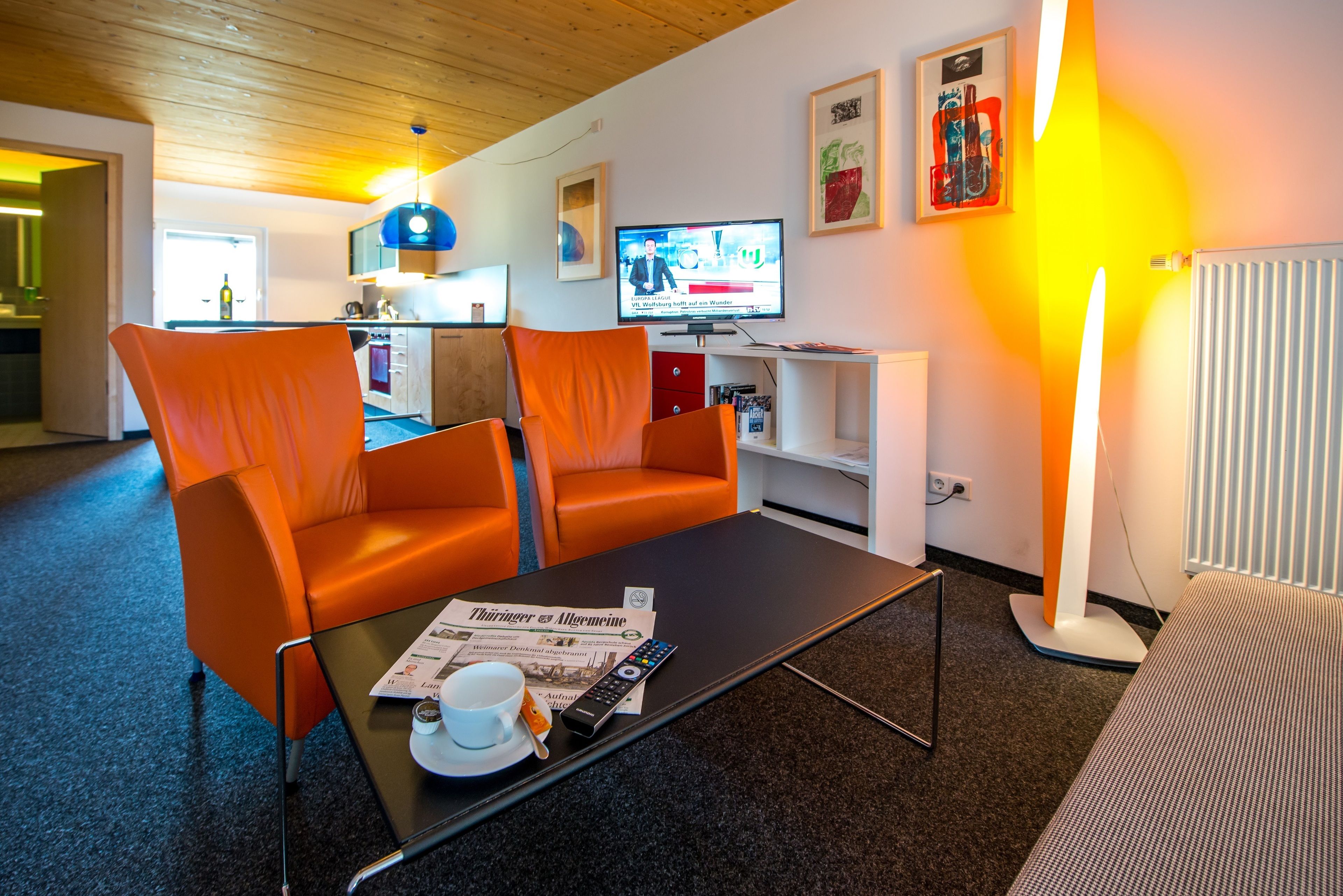 standard double room, 1 queen bed | living area | flat-screen tv