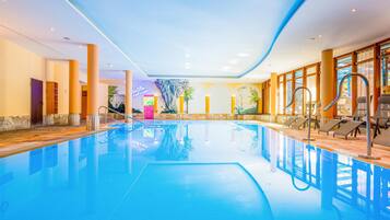 Indoor pool, open 6:30 AM to 10:00 PM, pool loungers