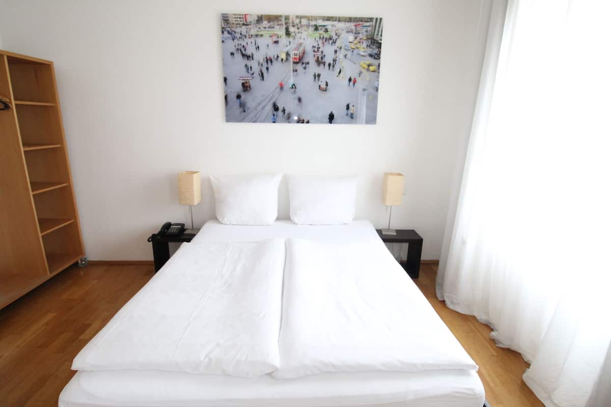 Tweepersoonskamer | Extra bedden, gratis wifi, beddengoed