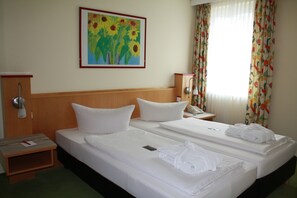 Dobbeltværelse | Pengeskab på værelset, strygejern/strygebræt, gratis Wi-Fi, sengetøj