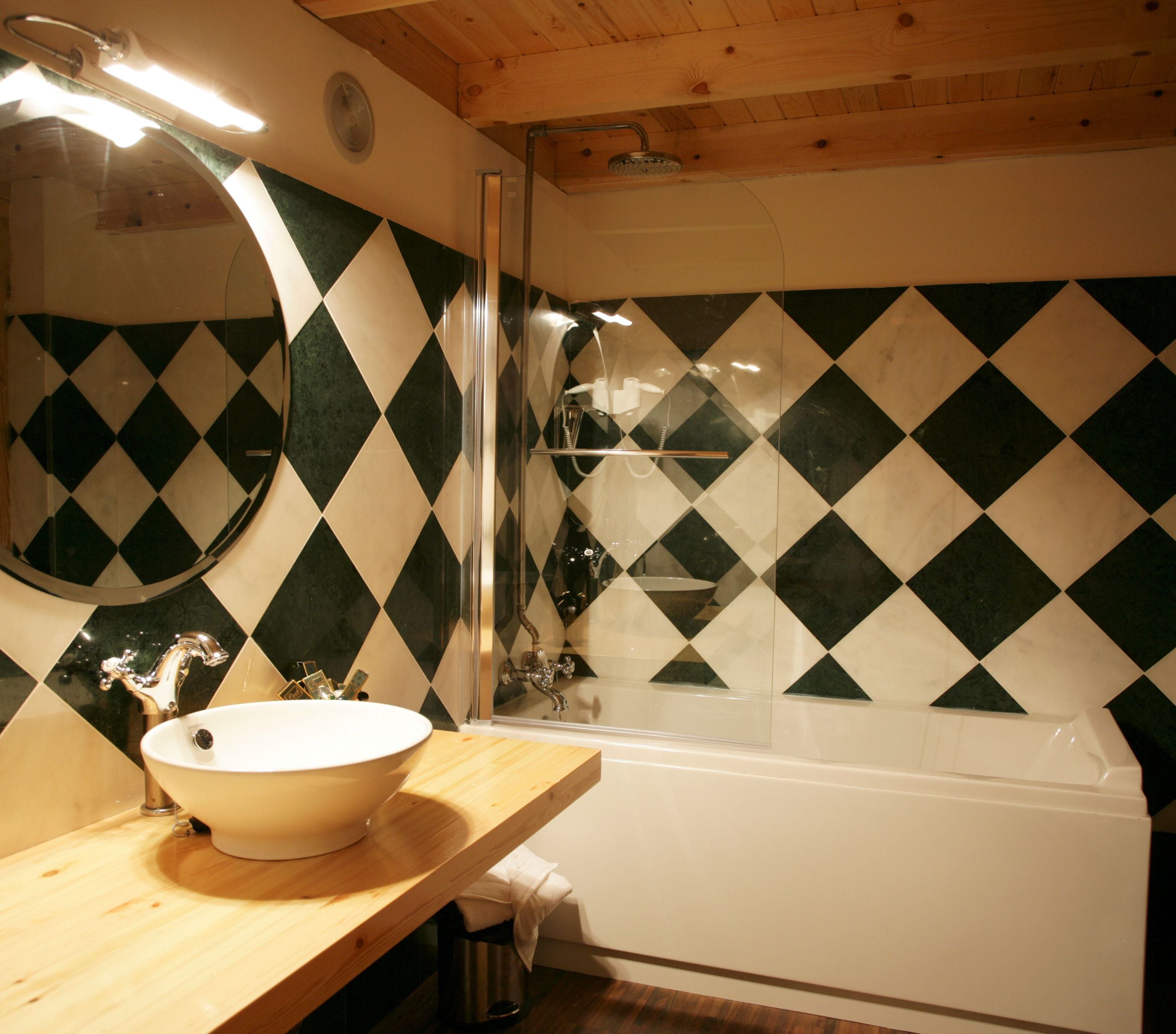 combined shower/bathtub, eco-friendly toiletries, hair dryer, bathrobes