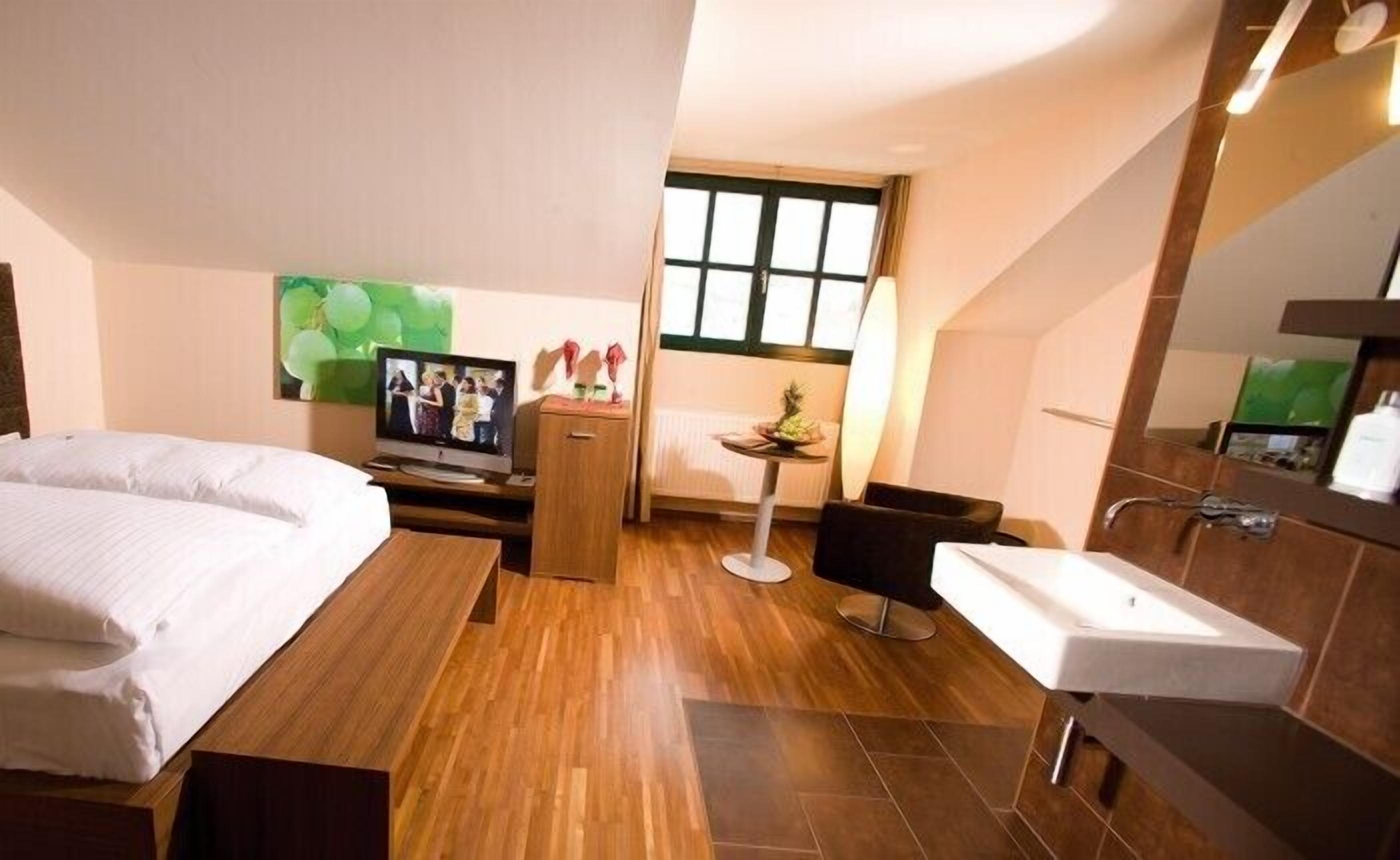 hypo-allergenic bedding, down duvets, minibar, in-room safe