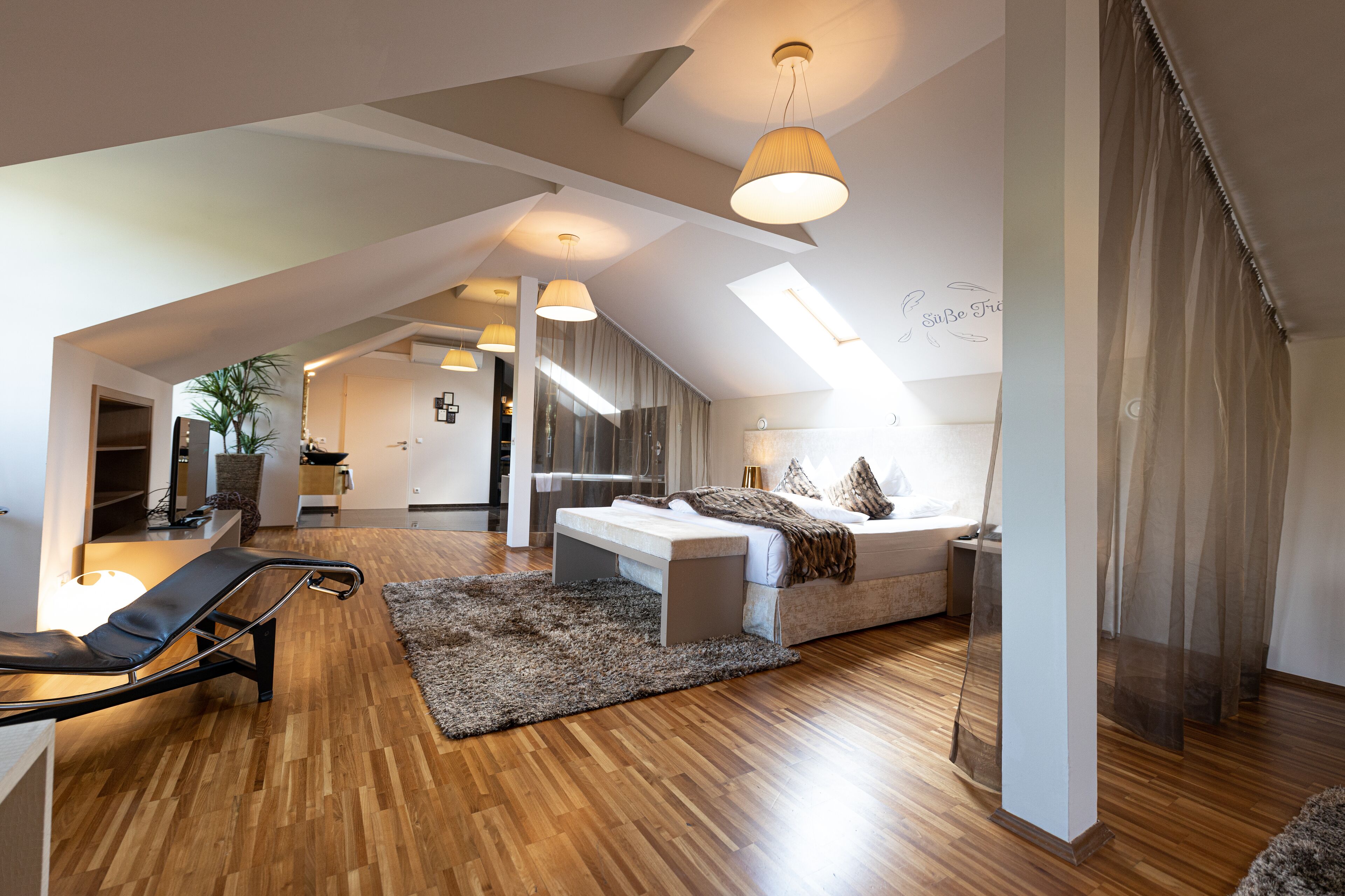 hypo-allergenic bedding, down duvets, minibar, in-room safe